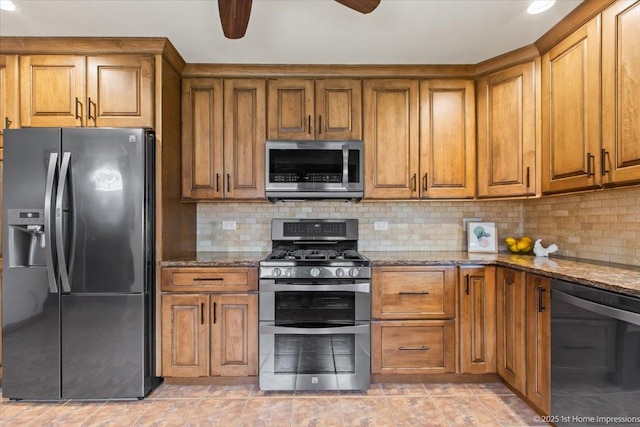 9144 S Trumbull Ave, Evergreen Park, IL 60805 - kitchen with appliances with stainless steel finishes, brown cabinets, ceiling fan, and stone counters