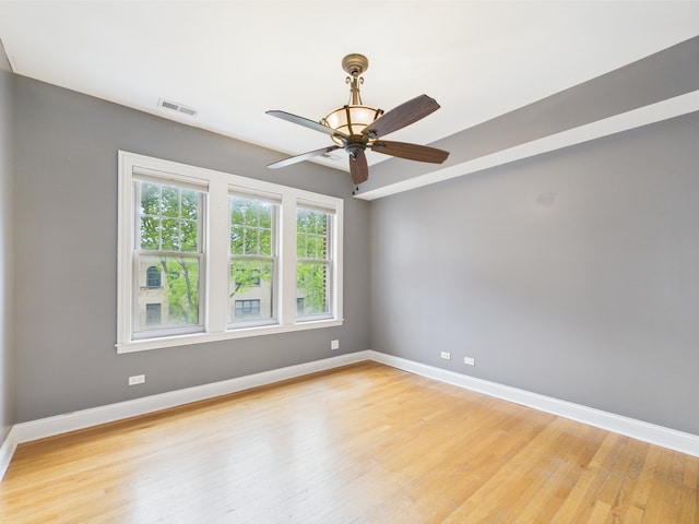 2609 W Rosemont Ave Unit C, Chicago, IL 60659 - unfurnished room with light wood-type flooring, baseboards, and ceiling fan