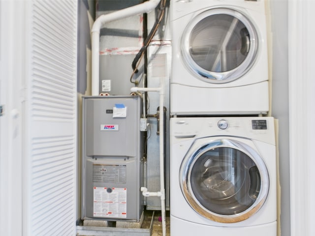 2609 W Rosemont Ave Unit C, Chicago, IL 60659 - washroom with stacked washing machine and dryer