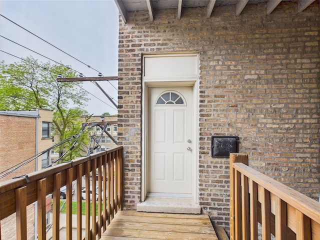 2609 W Rosemont Ave Unit C, Chicago, IL 60659 - entrance to property with brick siding and a balcony