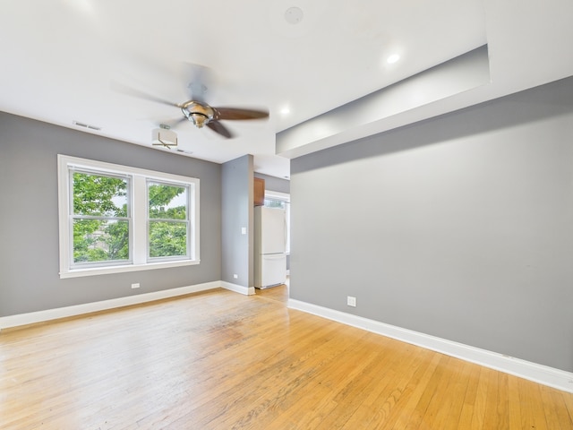 2609 W Rosemont Ave Unit C, Chicago, IL 60659 - empty room with a ceiling fan, light wood-style floors, baseboards, and recessed lighting