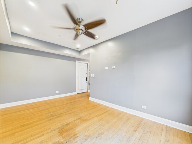 2609 W Rosemont Ave Unit C, Chicago, IL 60659 - unfurnished room featuring ceiling fan, baseboards, light wood finished floors, and recessed lighting