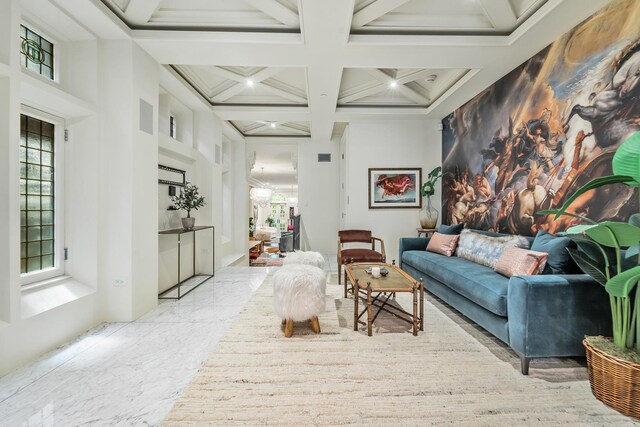 53 E Division St, Chicago, IL 60610 - living area with a chandelier, beam ceiling, and coffered ceiling