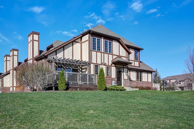 12709 Wild Rye Ct, Plainfield, IL 60585 - back of house with a pergola, a lawn, a chimney, and brick siding