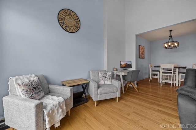 12709 Wild Rye Ct, Plainfield, IL 60585 - sitting room featuring light wood-style floors and a chandelier