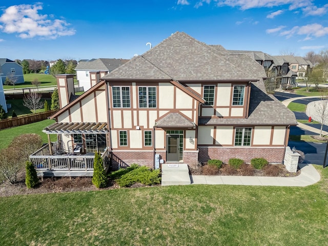 12709 Wild Rye Ct, Plainfield, IL 60585 - view of front of home with a shingled roof, stucco siding, brick siding, and a front lawn