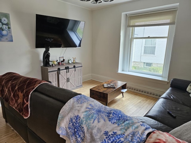 427 W Hurlbut Ave, Belvidere, IL 61008 - living area with wood finished floors, plenty of natural light, and crown molding