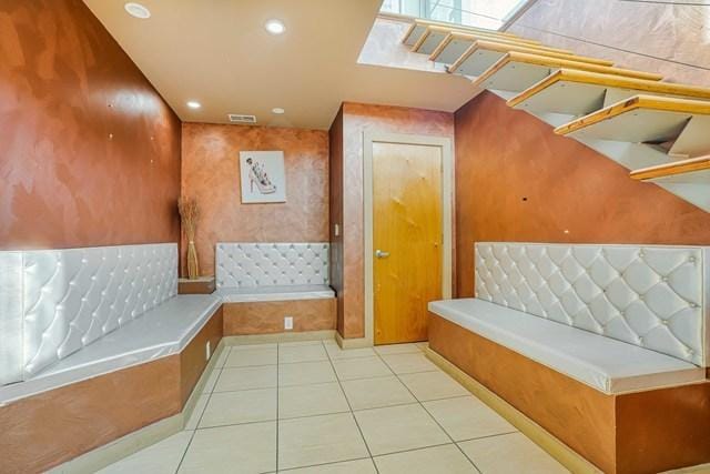 1412 W Division St Unit C-1, Chicago, IL 60642 - bathroom featuring tile patterned flooring, a garden tub, and recessed lighting