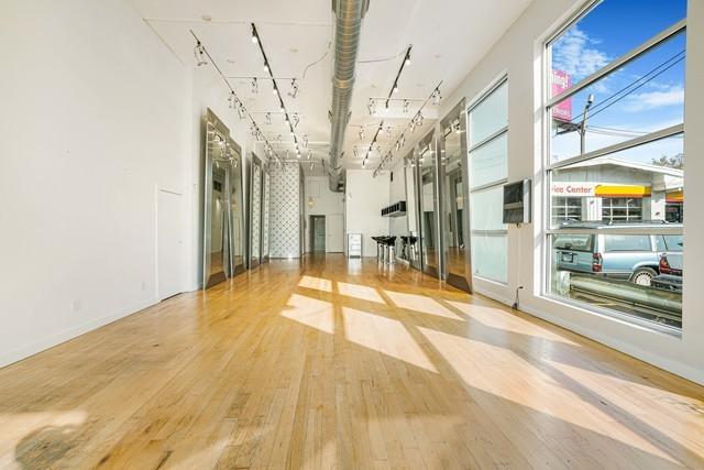 1412 W Division St Unit C-1, Chicago, IL 60642 - unfurnished room featuring hardwood / wood-style floors and baseboards