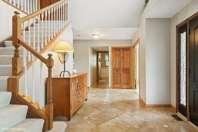 904 Warwick Ln, Lake Zurich, IL 60047 - foyer entrance featuring baseboards and stairway