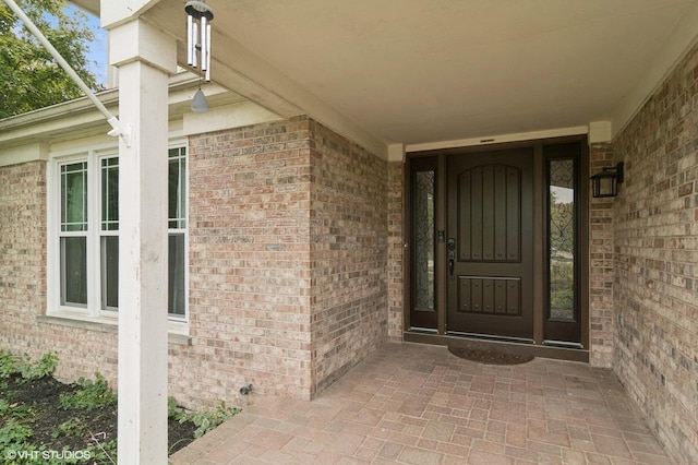 904 Warwick Ln, Lake Zurich, IL 60047 - view of exterior entry with brick siding