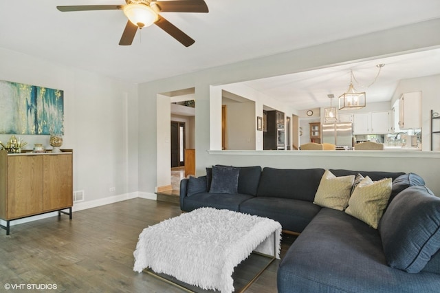 904 Warwick Ln, Lake Zurich, IL 60047 - living area featuring dark wood finished floors, ceiling fan, and a chandelier