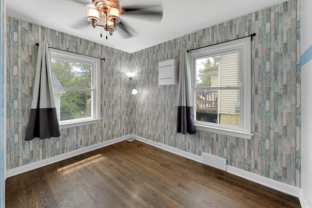 301 W Graham Ave, Lombard, IL 60148 - spare room featuring baseboards, wood finished floors, ceiling fan, and wallpapered walls