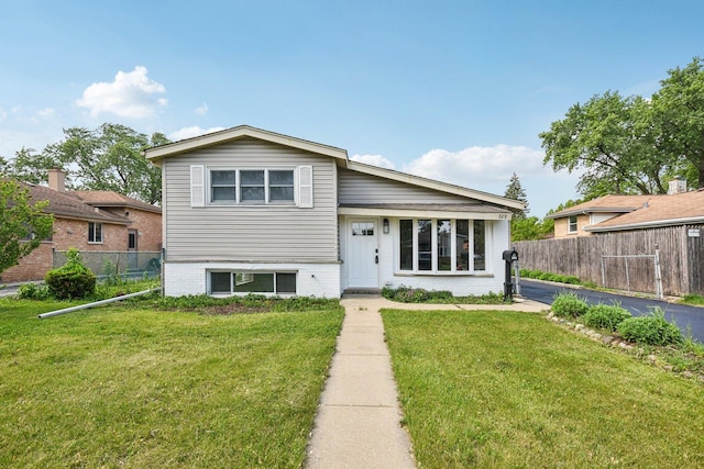 329 E Jefferson St, Bensenville, IL 60106 - split level home featuring brick siding
