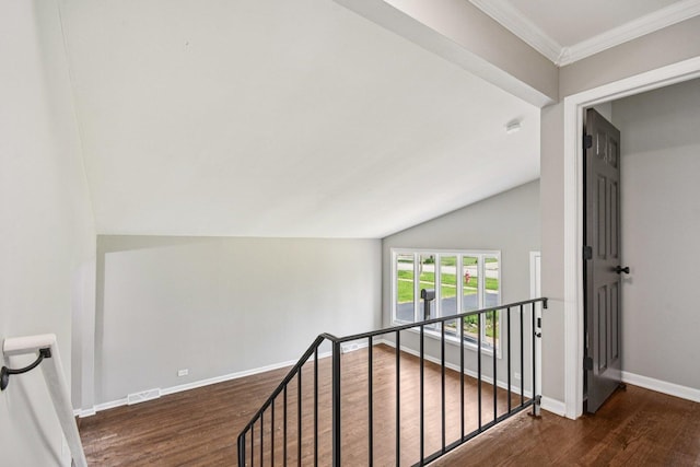 329 E Jefferson St, Bensenville, IL 60106 - corridor featuring wood finished floors, an upstairs landing, vaulted ceiling, baseboards, and ornamental molding