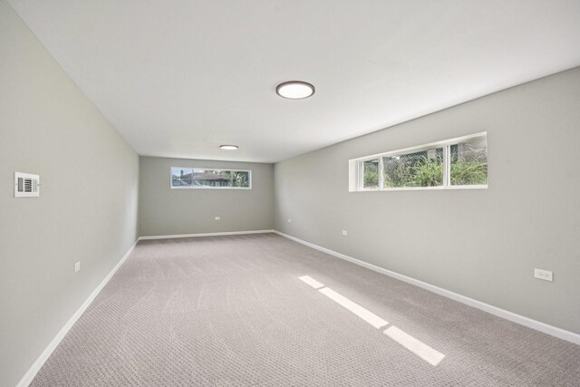 329 E Jefferson St, Bensenville, IL 60106 - carpeted empty room featuring baseboards