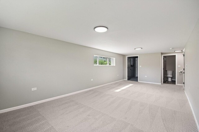 329 E Jefferson St, Bensenville, IL 60106 - empty room featuring baseboards and light carpet