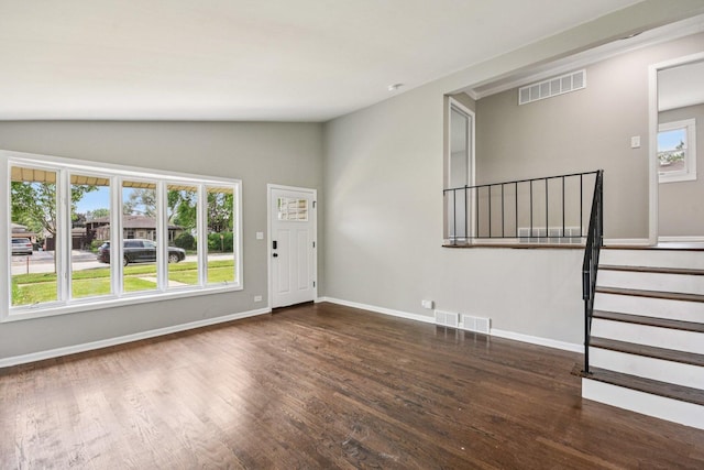 329 E Jefferson St, Bensenville, IL 60106 - foyer entrance featuring wood finished floors, lofted ceiling, baseboards, and stairs