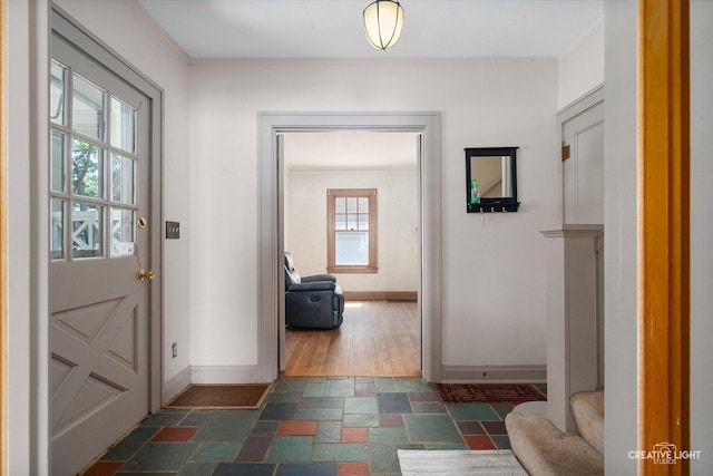 1044 Garfield Ave, Aurora, IL 60506 - entrance foyer featuring stone finish floors and crown molding