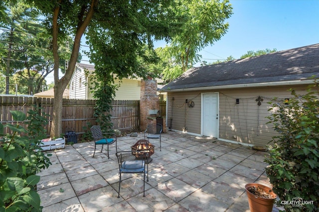 1044 Garfield Ave, Aurora, IL 60506 - view of patio / terrace with a fire pit