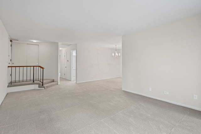913 Knottingham Dr Unit 2A, Schaumburg, IL 60193 - carpeted spare room featuring a chandelier, stairs, and baseboards