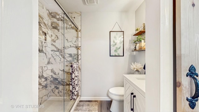 1176 Westport Rdg, Crystal Lake, IL 60014 - full bath featuring toilet, a marble finish shower, vanity, wood finished floors, and baseboards