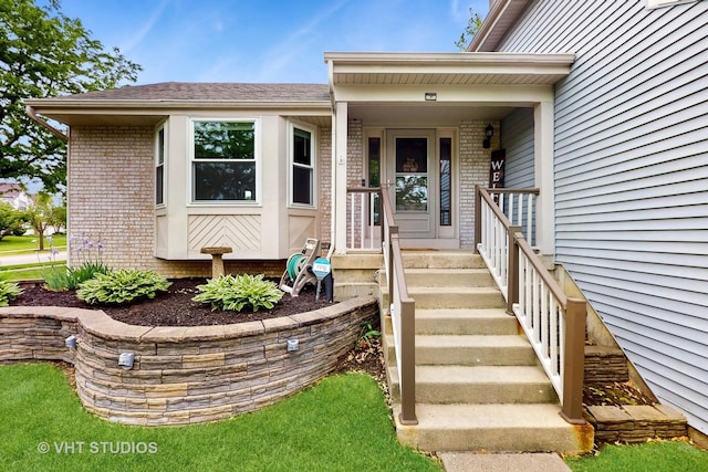 1176 Westport Rdg, Crystal Lake, IL 60014 - property entrance with brick siding and a shingled roof