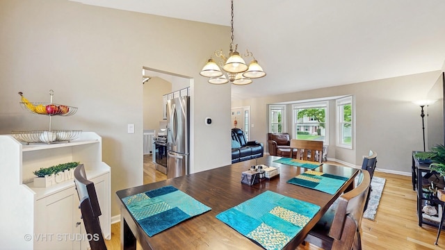 1176 Westport Rdg, Crystal Lake, IL 60014 - dining space with a chandelier, light wood finished floors, and baseboards