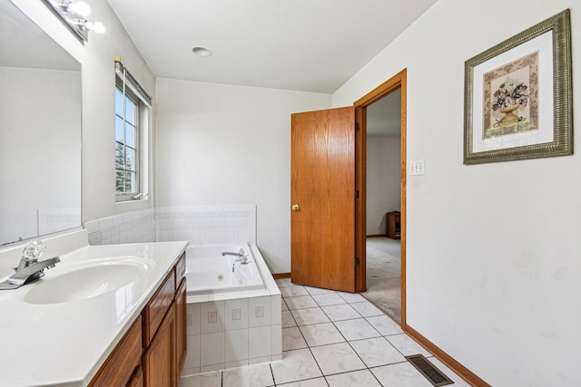 3410 Beckwith Ln, Crete, IL 60417 - bathroom featuring vanity, a tub with jets, and tile patterned flooring