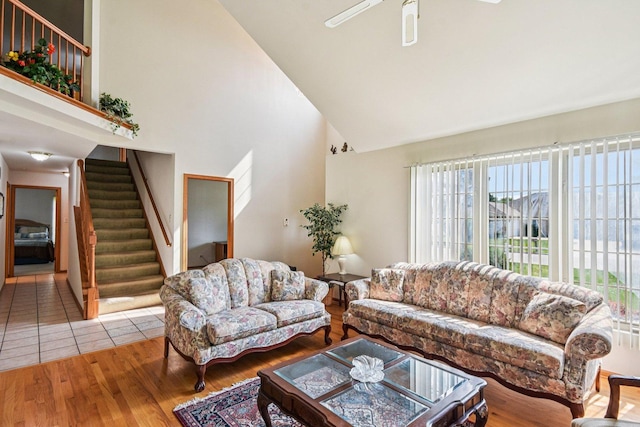 3410 Beckwith Ln, Crete, IL 60417 - living area with high vaulted ceiling, stairs, wood finished floors, and ceiling fan