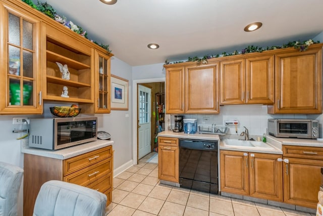 3528 Ernst St, Franklin Park, IL 60131 - kitchen featuring black dishwasher, stainless steel microwave, light countertops, and recessed lighting