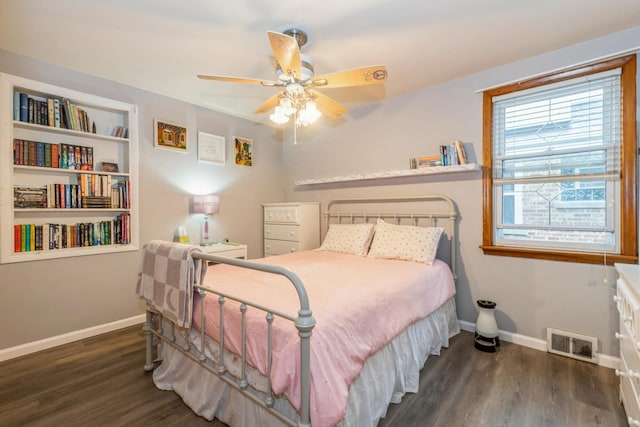 3528 Ernst St, Franklin Park, IL 60131 - bedroom with wood finished floors, baseboards, and ceiling fan