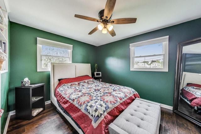 1086 E Thacker St, Des Plaines, IL 60016 - bedroom with multiple windows, dark wood-style floors, a ceiling fan, and baseboards