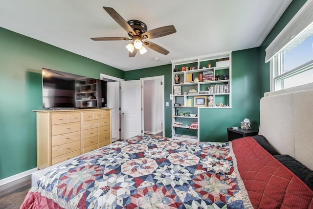 1086 E Thacker St, Des Plaines, IL 60016 - bedroom featuring baseboards, a ceiling fan, and wood finished floors