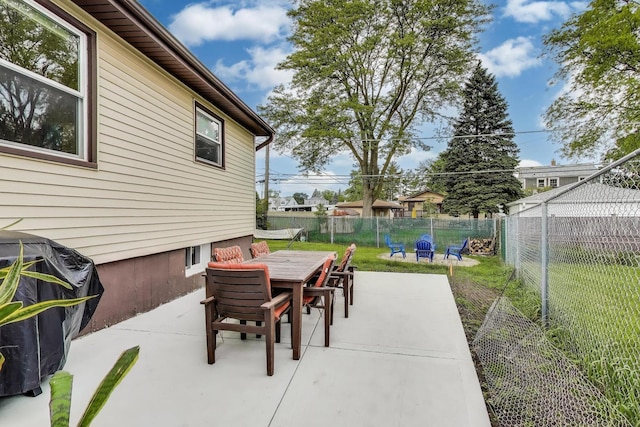 1086 E Thacker St, Des Plaines, IL 60016 - view of patio / terrace featuring outdoor dining space, grilling area, and an outdoor fire pit