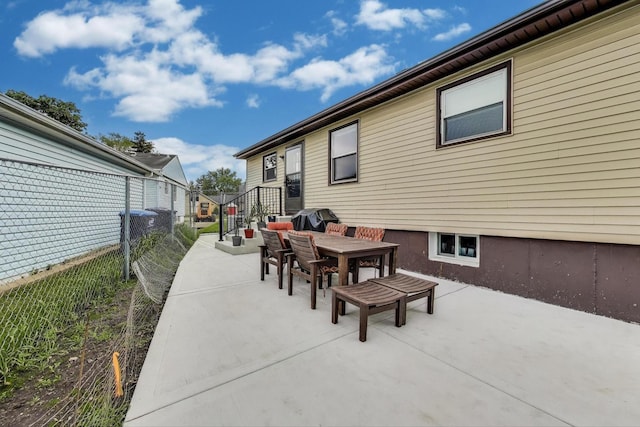 1086 E Thacker St, Des Plaines, IL 60016 - view of patio featuring outdoor dining space and a grill