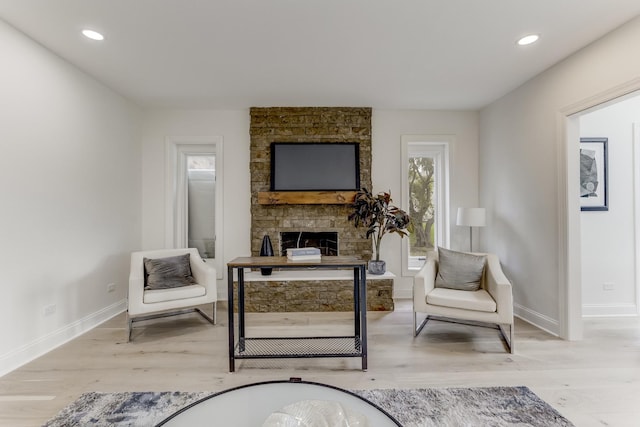 13045 Silver Fox Dr, Lemont, IL 60439 - sitting room featuring baseboards, light wood-style floors, a fireplace, and recessed lighting