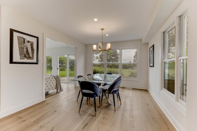 13045 Silver Fox Dr, Lemont, IL 60439 - dining room featuring a chandelier, light wood-style floors, baseboards, and recessed lighting
