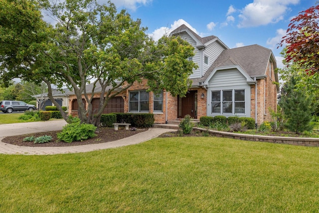 13045 Silver Fox Dr, Lemont, IL 60439 - view of front of house with brick siding, a front lawn, concrete driveway, and a shingled roof