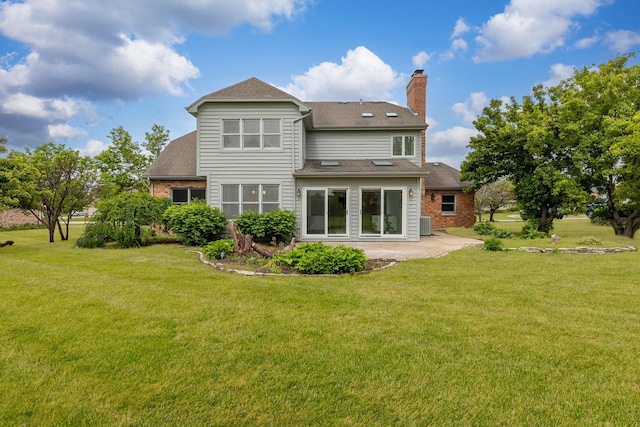 13045 Silver Fox Dr, Lemont, IL 60439 - rear view of house featuring a chimney, a lawn, a patio, and a shingled roof