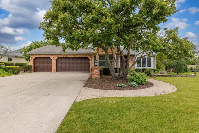 13045 Silver Fox Dr, Lemont, IL 60439 - view of front of house with brick siding, driveway, a garage, and a front lawn
