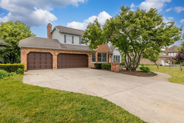13045 Silver Fox Dr, Lemont, IL 60439 - view of front of house with driveway, a front yard, brick siding, a chimney, and a garage