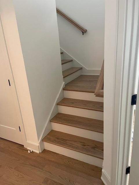 1672 Huntington Ln, Highland Park, IL 60035 - stairs featuring wood finished floors and baseboards