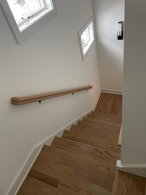 1672 Huntington Ln, Highland Park, IL 60035 - stairway with baseboards and wood finished floors