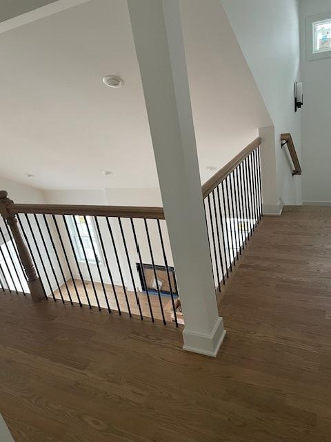 1672 Huntington Ln, Highland Park, IL 60035 - stairway featuring wood finished floors and baseboards