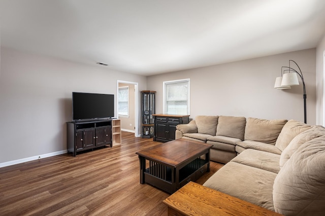 208 N Fremont St, Naperville, IL 60540 - living area with dark wood-style floors and baseboards