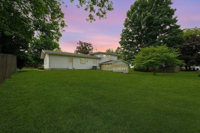 404 Maple Ln, Monticello, IL 61856 - yard at dusk with central air condition unit