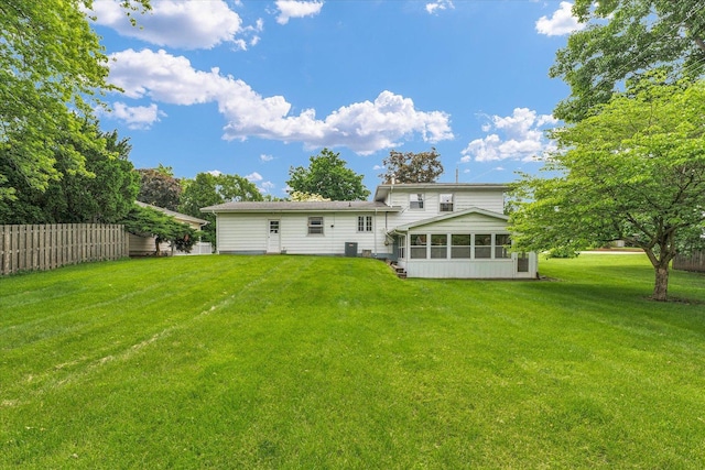 404 Maple Ln, Monticello, IL 61856 - back of house with a sunroom