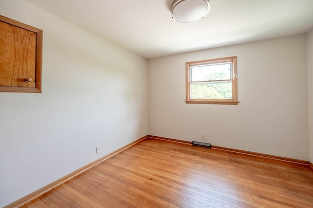 408 E Fabyan Pkwy, Batavia, IL 60510 - empty room featuring light wood-style floors and baseboards