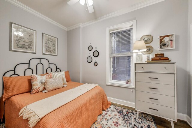 1908 N Whipple St Unit 2, Chicago, IL 60647 - bedroom featuring baseboards, ornamental molding, wood finished floors, and ceiling fan